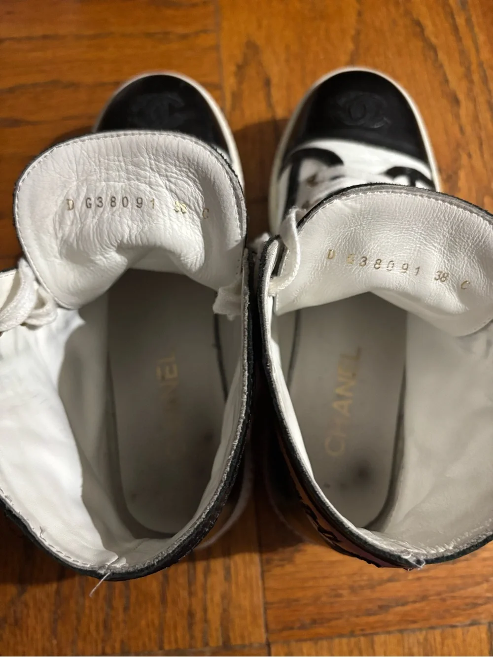CHANEL White and Black Logo High-Top Sneakers